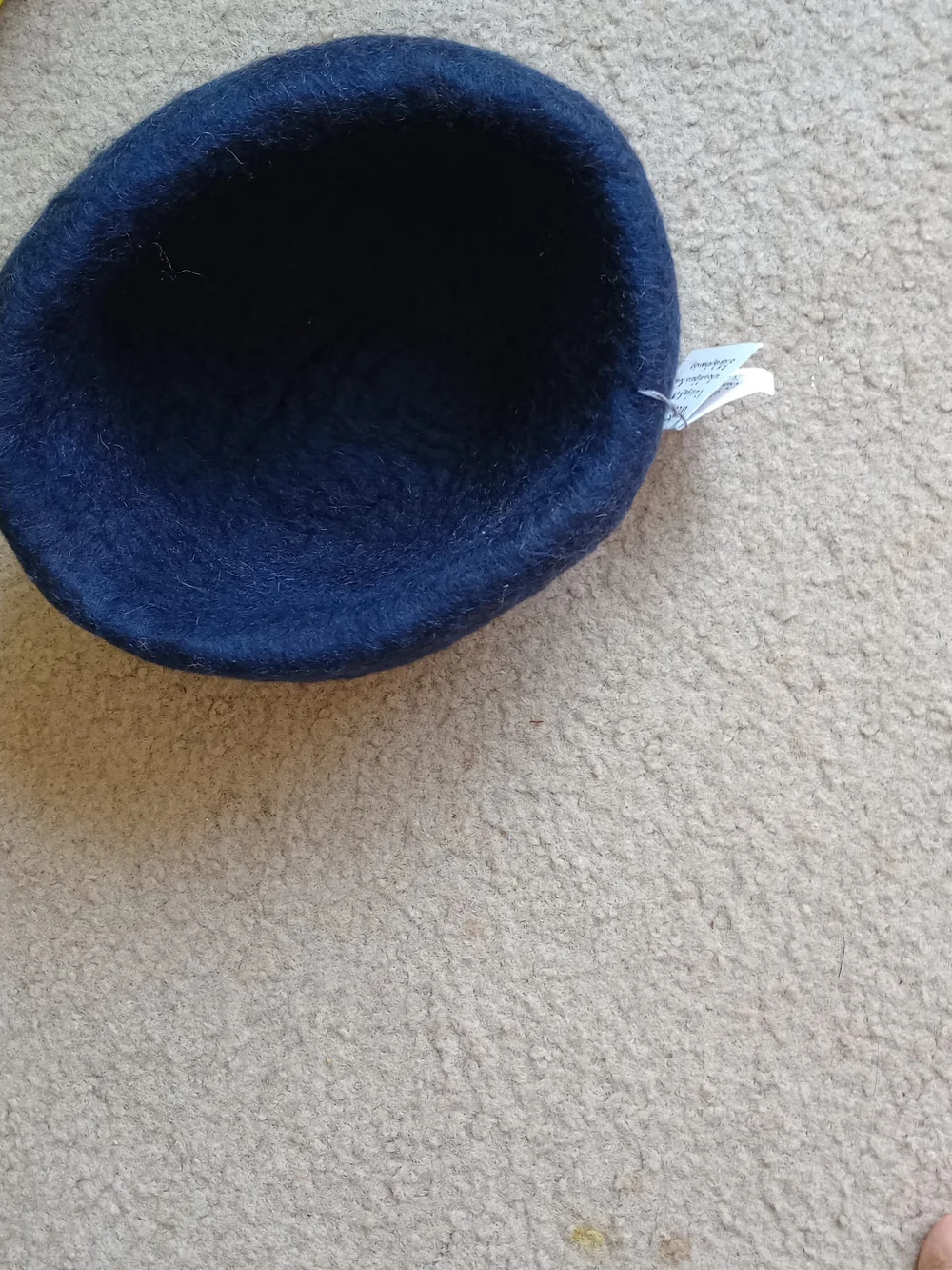 Sgailean handmade blue and rust-colored felted wool cloche hat.